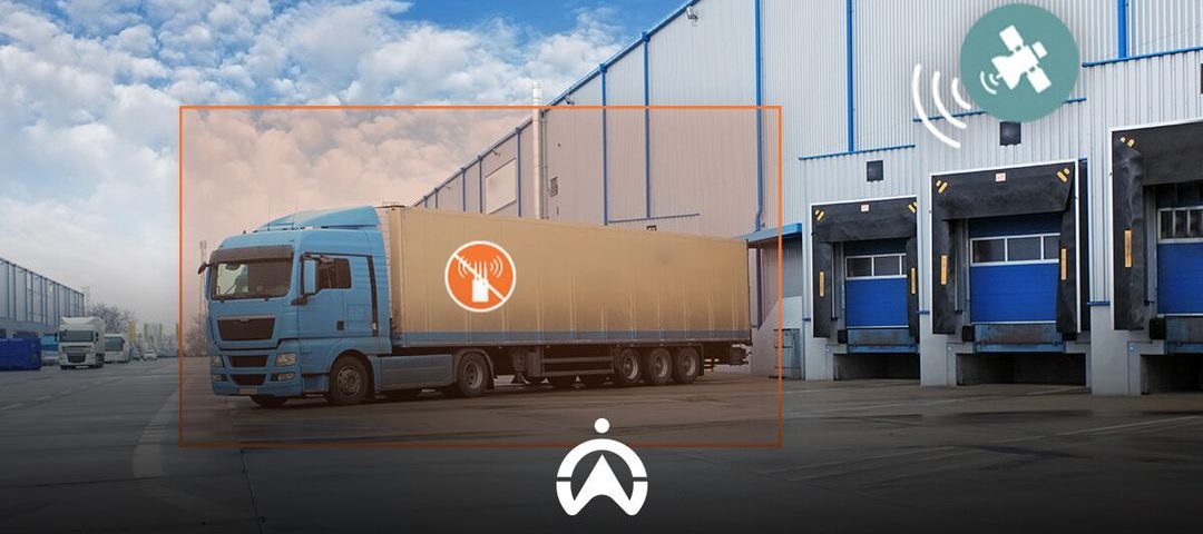 A blue truck parked outside a warehouse, featuring a no-sound symbol, with loading docks visible in the background and satellite signal icons.