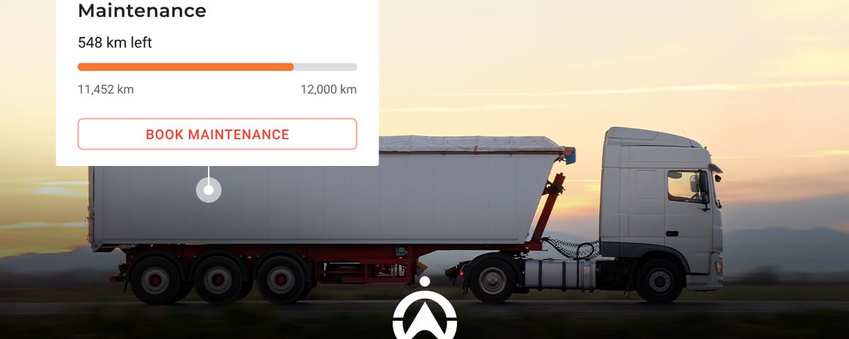 A white truck driving on a road at sunset, displaying a maintenance progress bar indicating 548 km left until service.