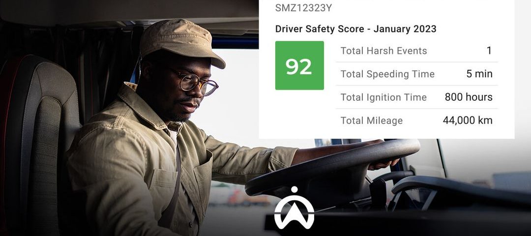 A truck driver monitors vehicle metrics, showcasing a Driver Safety Score of 92, with details on harsh events, speeding, ignition, and mileage.
