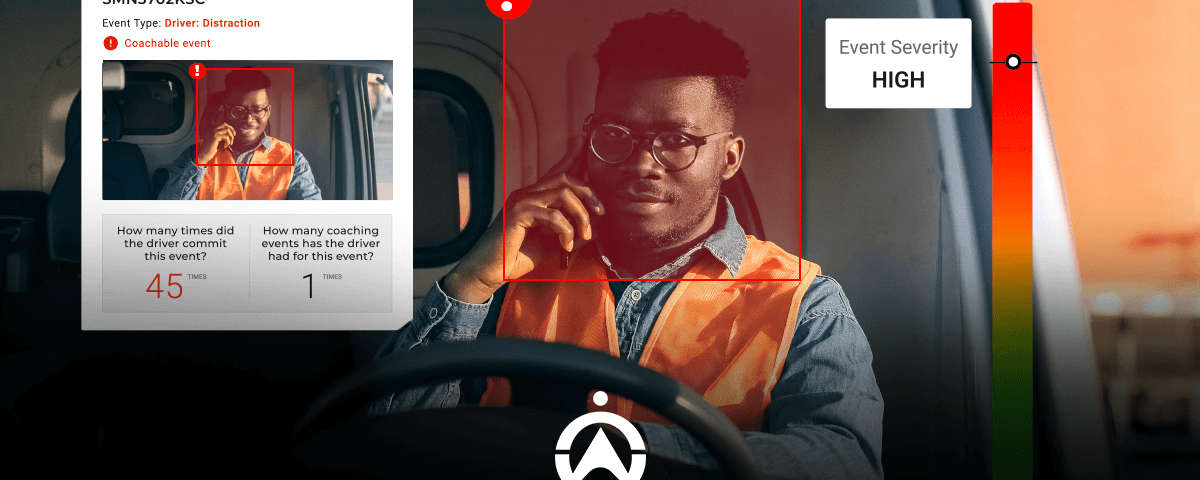 A driver in a safety vest inside a vehicle, with a high severity alert about driver distraction on a digital display.