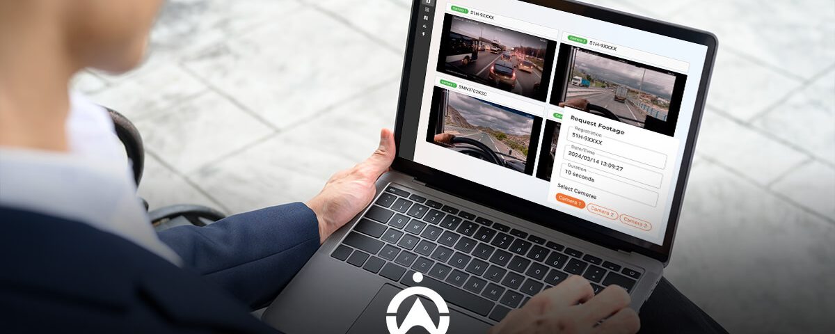A person using a laptop displaying a video footage request interface with various camera views and settings.