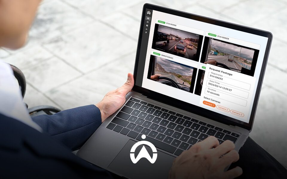 A person using a laptop displaying a video footage request interface with various camera views and settings.