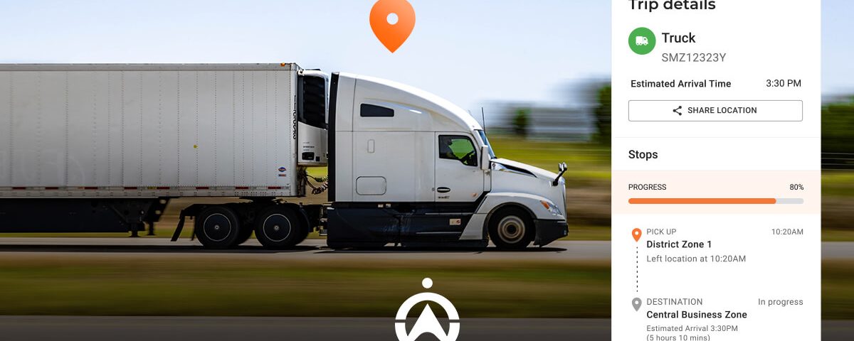 A white semi-truck drives on a highway, displaying real-time trip details including stops and estimated arrival time.