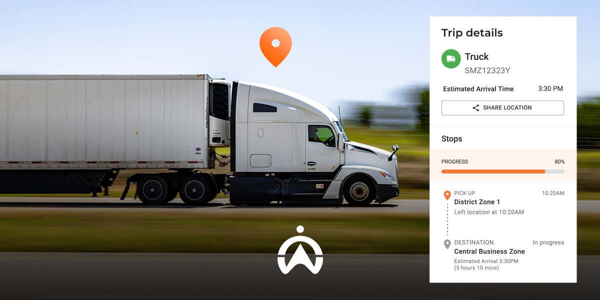 A white semi-truck drives on a highway, displaying real-time trip details including stops and estimated arrival time.