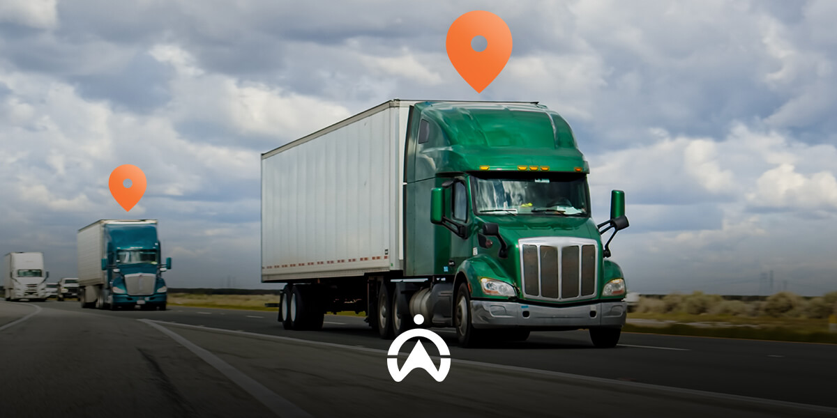 Two green semi-trucks drive on a highway under a cloudy sky, with location markers above them symbolizing tracking.